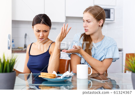 Emotional quarrel between two women Emotional quarrel between two women 61324367