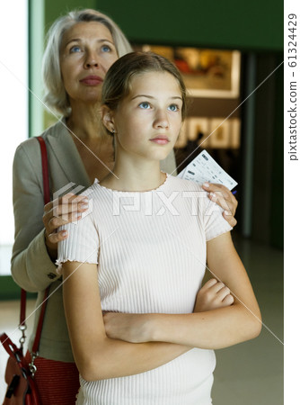 Woman and girl visiting museum 61324429