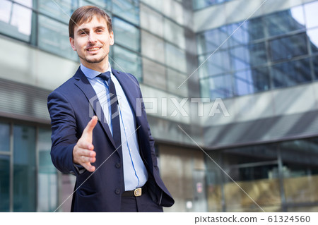 Cheerful man office worker in suit Cheerful man office worker in suit 61324560