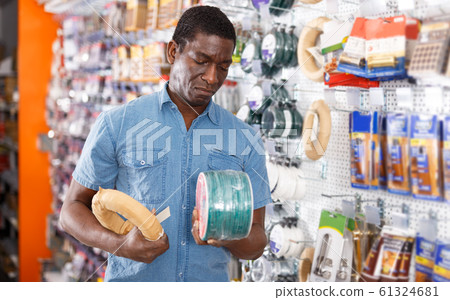 Foreman shopping in building hypermarket Foreman shopping in building hypermarket 61324681