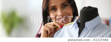 Joyful female tailor Joyful female tailor 61325466