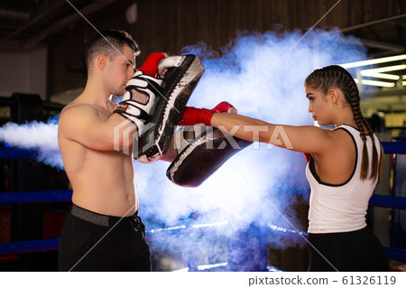 Boxing couple training together Boxing couple training together 61326119