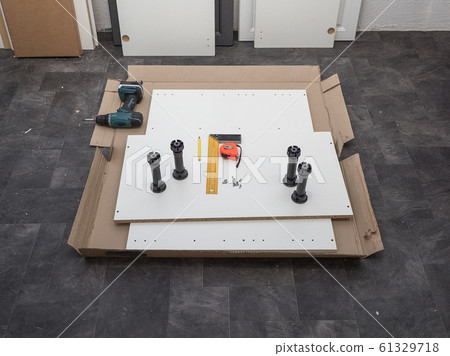 Open box with furniture. 61329718