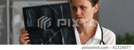 Happy female doctor Happy female doctor 61329977