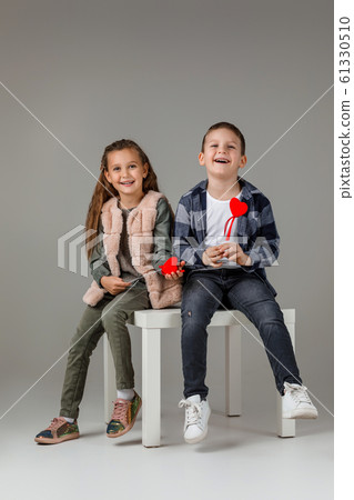 couple child girl and boy in fashionable clothes 61330510