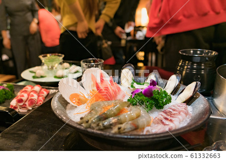 hotpot Chinese sytel with seafood set and belly pork at restaurant 61332663