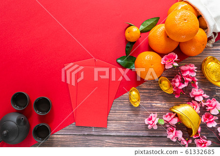 Chinese New Year offering red envelope chinese tea pot and orange 61332685