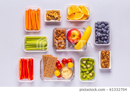 Healthy snack on a pastel background. Healthy snack on a pastel background. 61332704