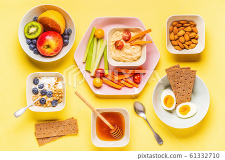Healthy snack on a pastel background. 61332710