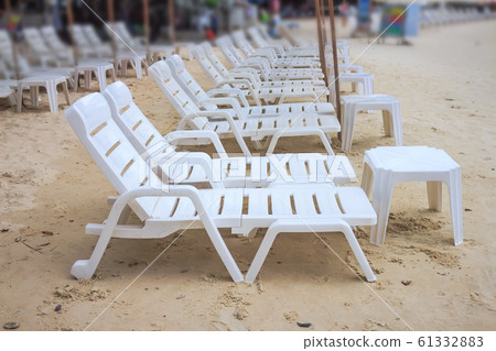 Chair relaxing on the beach Chair relaxing on the beach 61332883