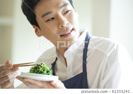 Man cooking Man cooking 61333241