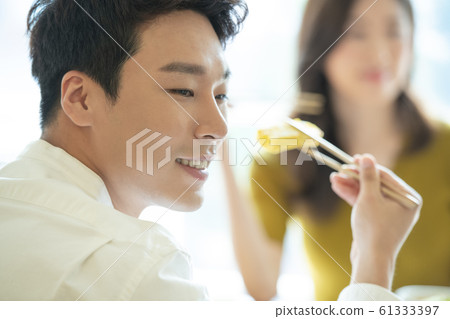 Couple eating Couple eating 61333397