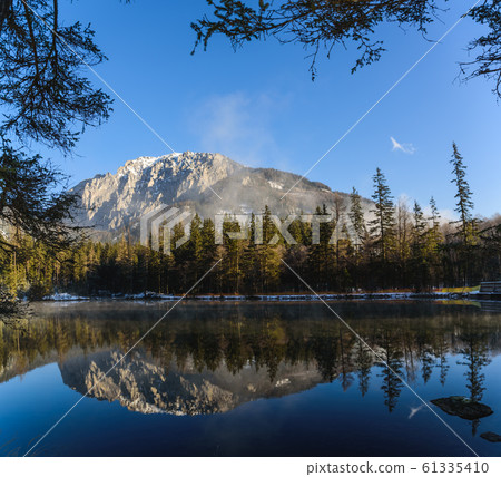 Peaceful mountain panorama view with Kreuzteich in Peaceful mountain panorama view with Kreuzteich in 61335410
