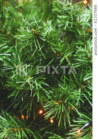 Green branches of plastic not natural christmas Green branches of plastic not natural christmas 61337666