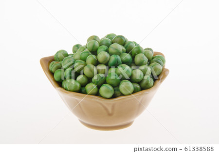 nuts or green pea on a background new. nuts or green pea on a background new. 61338588