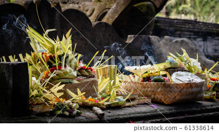 Incense and offerings in a Balinese temple Incense and offerings in a Balinese temple 61338614