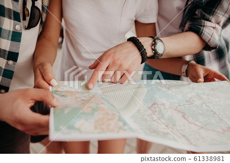 The Guy Is Pointing On The Direction On The Map. 61338981