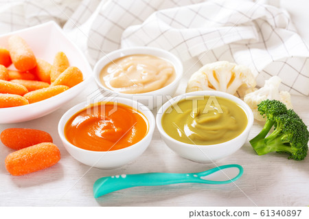 Baby food. Various kinds of bowls of vegetable 61340897