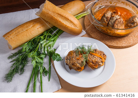 Rissole of pork served on a white plate with white 61341416