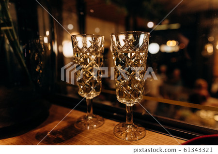 two crystal glasses festive champagne blur light two crystal glasses festive champagne blur light 61343321