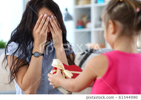 Family exchanging gifts 61344990