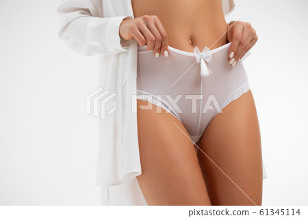 Faceless woman with hands on panties Faceless woman with hands on panties 61345114