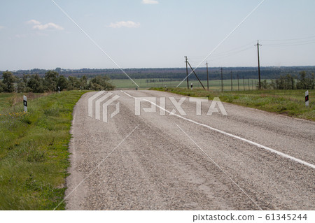 Smooth asphalt road to the mountains road 61345244