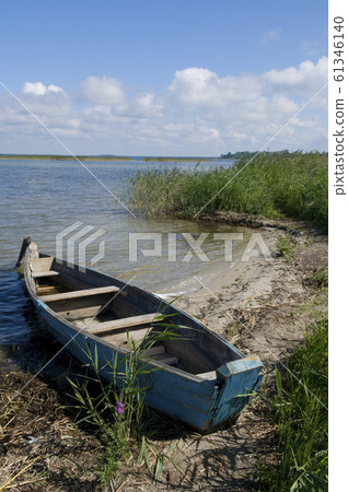 Wooden boat on the lake 61346140