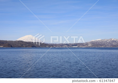 Mt. Yotei and Mount Shiribetsu seen from Lake Toya Mt. Yotei and Mount Shiribetsu seen from Lake Toya 61347847