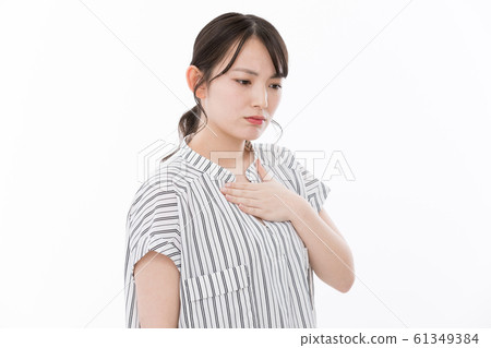 Young Woman Negative Heartburn Young Woman Negative Heartburn 61349384