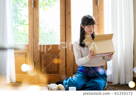 Mail order shopping women luggage lifestyle 61350172