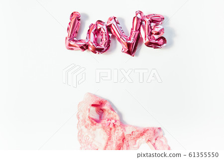 Love concept. Inflatable pink balloon with letters Love concept. Inflatable pink balloon with letters 61355550
