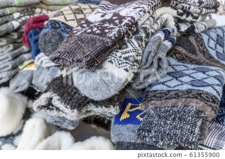 handmade, knitted woven socks as a background 61355900