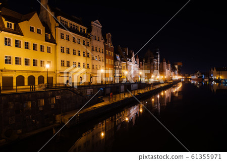 evening streets of old Gdansk, bridge over the main river, central tourist street 61355971