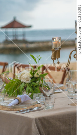 Table in the Restaurant on the Beach, Bali Table in the Restaurant on the Beach, Bali 61356393