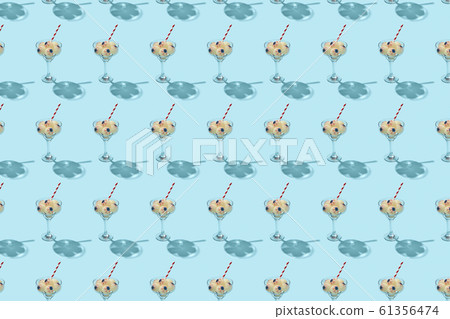 Cocktail glass with eyeballs pattern with shadows. Cocktail glass with eyeballs pattern with shadows. 61356474