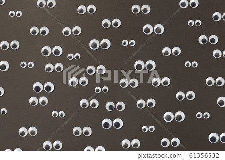 Pattern from Googly eyes of different sizes. Pattern from Googly eyes of different sizes. 61356532
