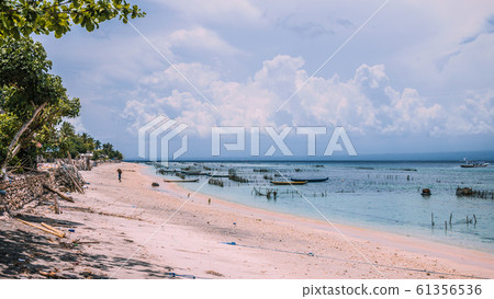 Seaweed plantation farm by Low Tide in Nusa Penida, Bali in Clouds on Background, Indonesia Seaweed plantation farm by Low Tide in Nusa Penida, Bali in Clouds on Background, Indonesia 61356536