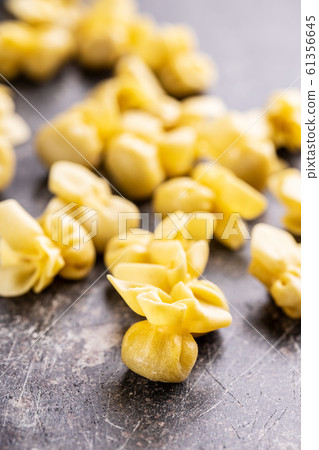 Italian stuffed pasta. Sacchettini pasta. 61356645