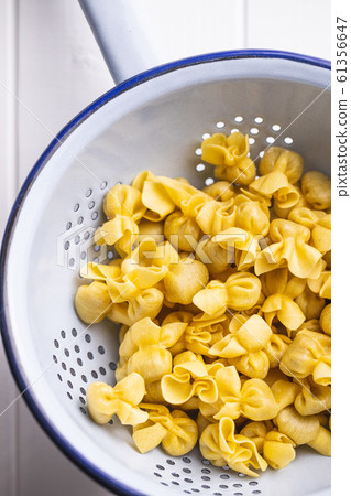 Italian stuffed pasta. Sacchettini pasta. 61356647