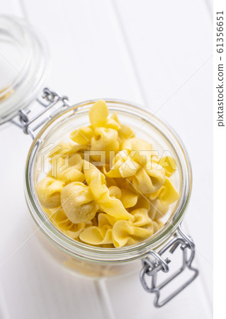 Italian stuffed pasta. Sacchettini pasta. Italian stuffed pasta. Sacchettini pasta. 61356651