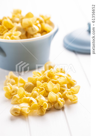 Italian stuffed pasta. Sacchettini pasta. Italian stuffed pasta. Sacchettini pasta. 61356652