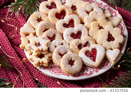 Traditional Linzer Christmas cookies on a plate Traditional Linzer Christmas cookies on a plate 61357038