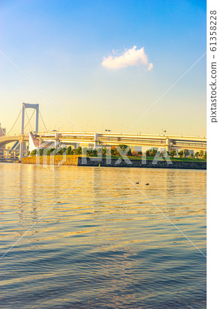 Rainbow bridge dyed in the sunset [Tokyo] 61358228