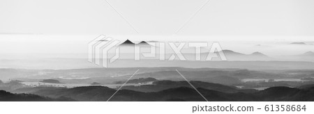 Bezdez twin mountains rising from the mist. Weather temperature inversion, Czech Republic Bezdez twin mountains rising from the mist. Weather temperature inversion, Czech Republic 61358684