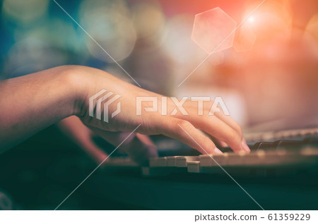 Playing the piano keyboard close up ,Cropped hands 61359229