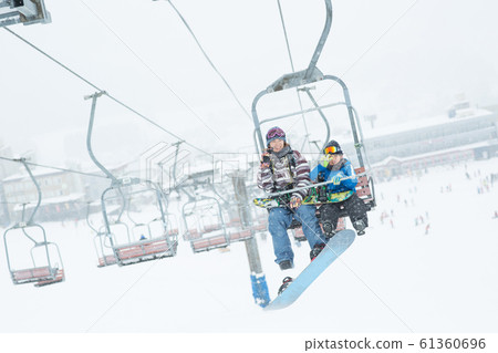 Family enjoying winter 61360696