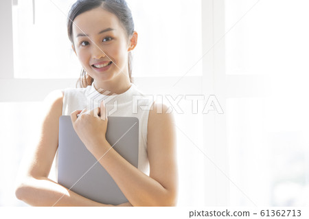 Smiling business woman 61362713