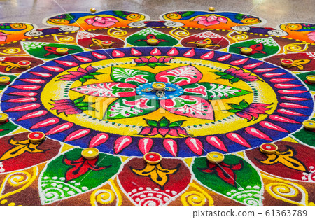 Colorful Indian traditional rangoli decoration for Diwali or Deepavali celebration Colorful Indian traditional rangoli decoration for Diwali or Deepavali celebration 61363789