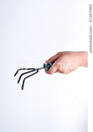 Garden fork rake close-up. 61363969